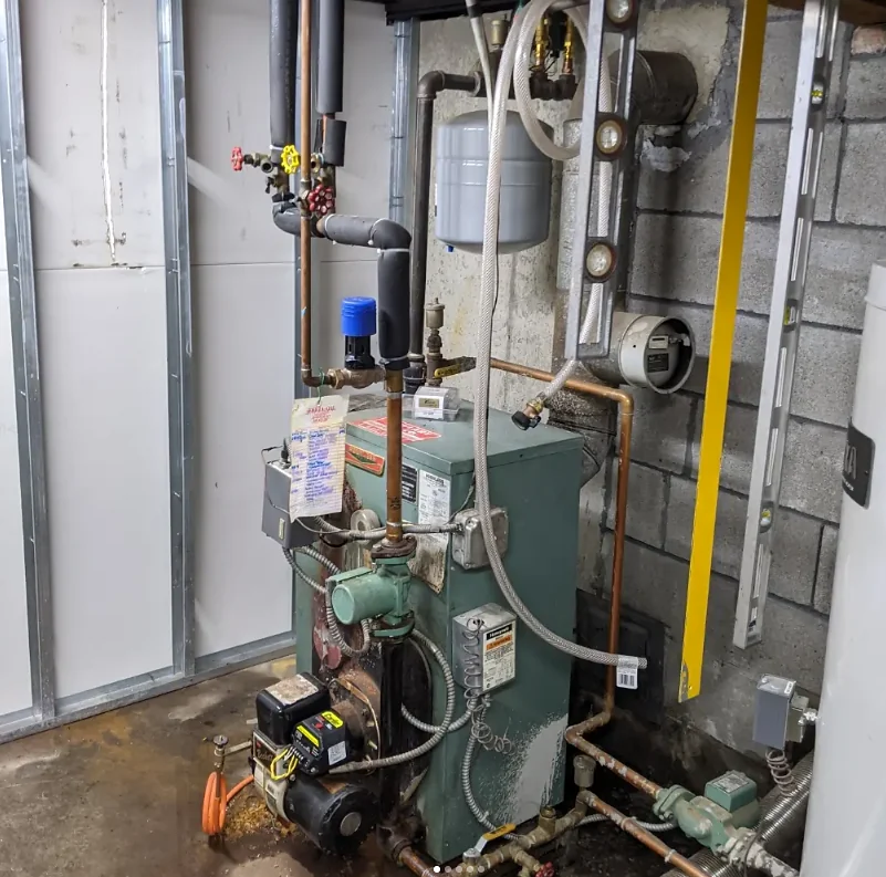 Boiler and pipework before replacement